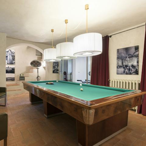 Get a game of pool going in the games room