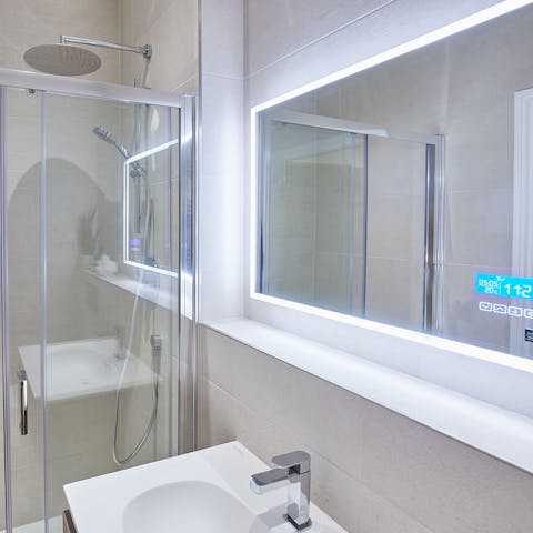 Enjoy the stylish bathroom, fitted with a futuristic Smart Mirror