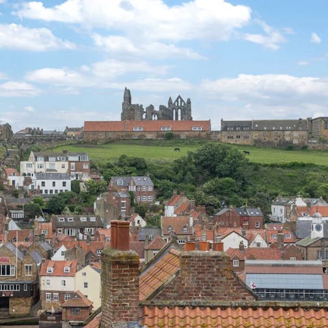 Gaze out over the rooftops towards Whitby Abbey – ascend the 199 steps to one of the most atmospheric ruins in Britain