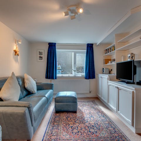 Cosy up in the living room and binge your favourite series on the smart TV