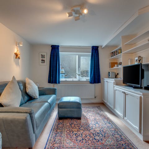 Cosy up in the living room and binge your favourite series on the smart TV