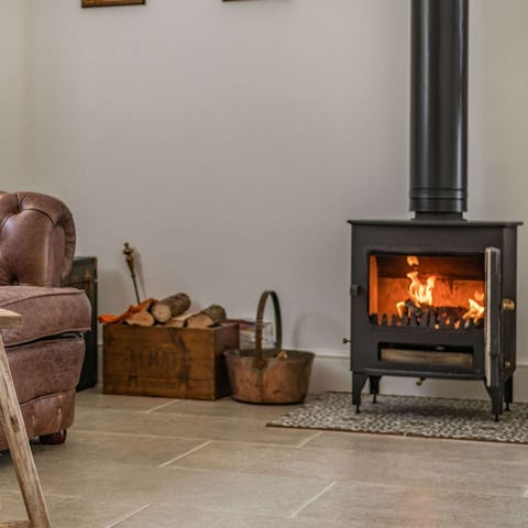 Curl up by the wood burner after a day visiting National Trust properties