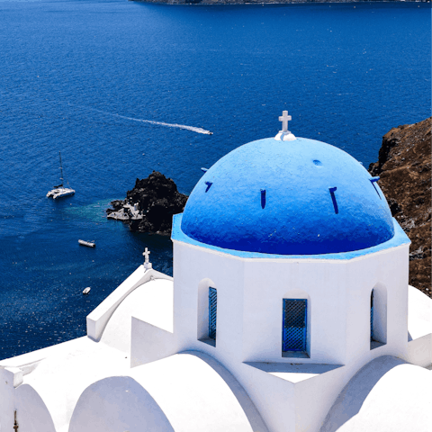 Walk to the nearest beach or adventure along the coast of Santorini 