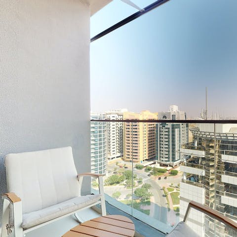 Enjoy city views from the private balcony