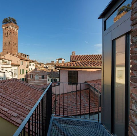 Perch on the balcony with a glass of Tuscan red as the sun goes down