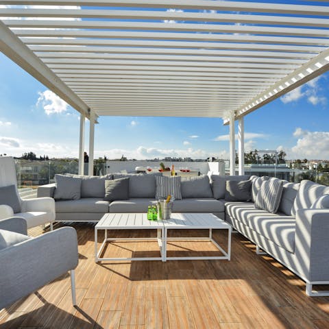 Sip a glass of wine on the roof terrace