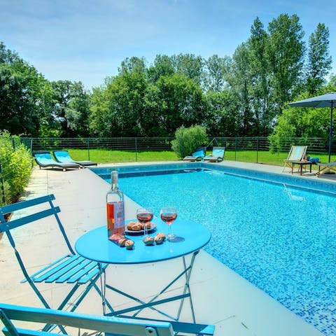 Bathe in the Périgourdine sunshine by the private pool