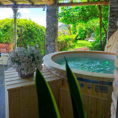 Relax in the hot tub as the quiet of nature surrounds you