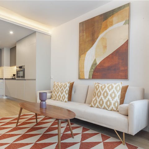 Pour a glass of wine and unwind in the light-filled living room