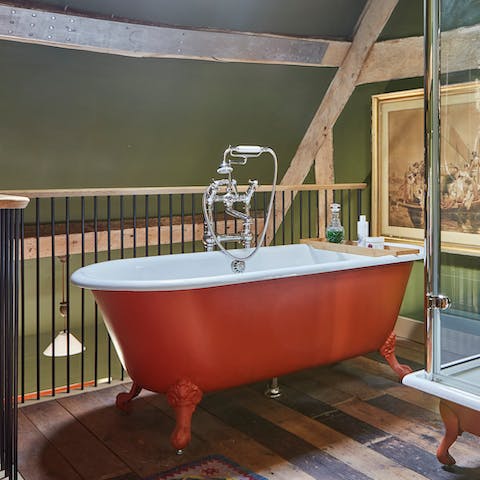 Unwind in the luxurious roll-top bath, part of an en-suite for each bedroom