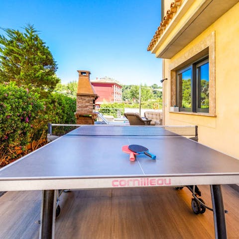 Play a few games of ping pong on the outdoor table