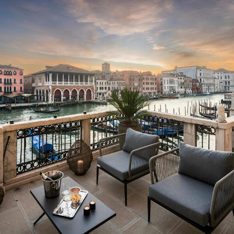 Admire the stunning views of the Grand Canal from the private terrace