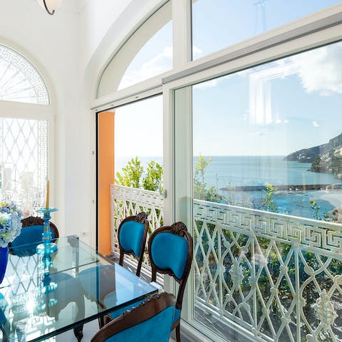 Dine with a view whether you're outdoors or in, with large windows inviting the scenery to you