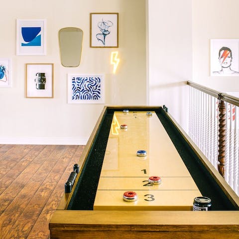 Set up a vintage game of shuffleboard