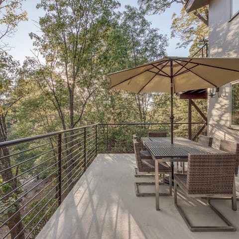 Have an alfresco dinner among the treetops on the balcony