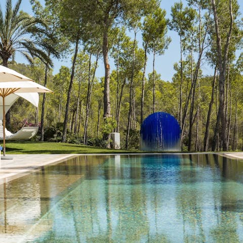 Admire the modern art that surrounds the pool