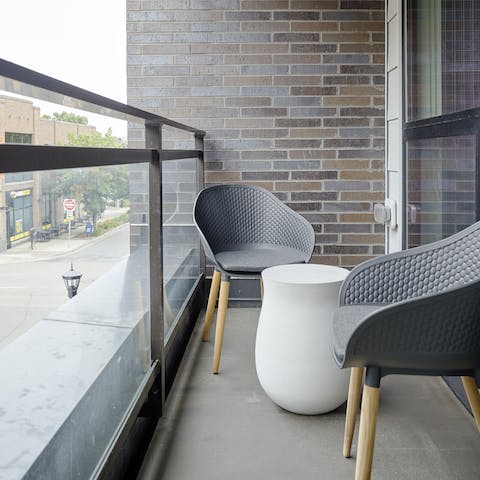 Enjoy your morning coffee on the private balcony while taking in views of your Uptown neighbourhood 
