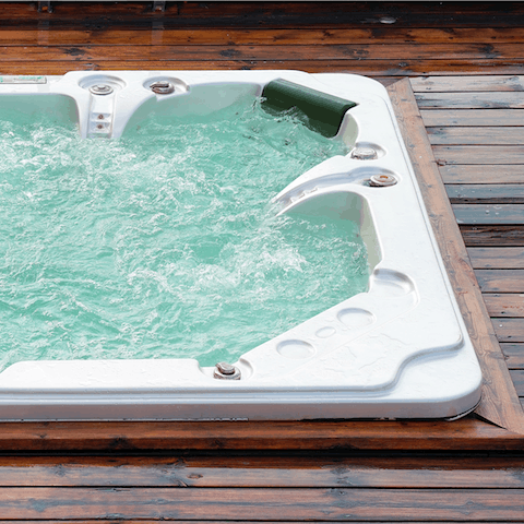Make your way to the shared rooftop hot tub for a relaxing end to your day