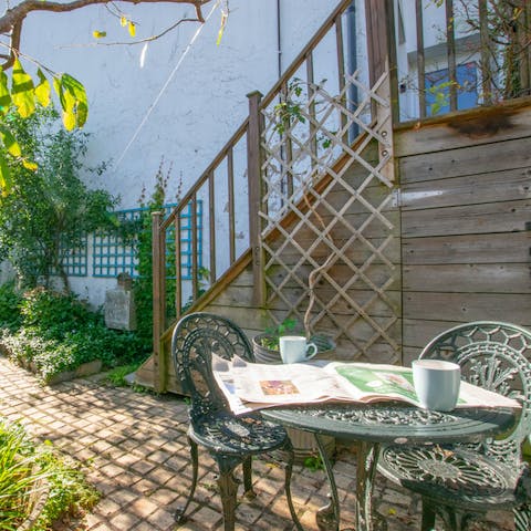 Enjoy an alfresco breakfast in the private leafy garden