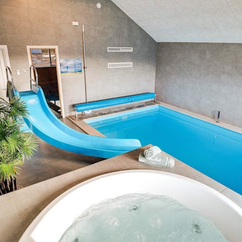 Slide into the swimming pool or take a long soak in the Jacuzzi