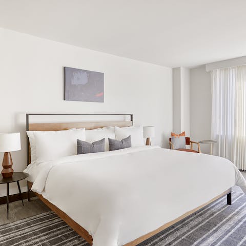 Sink into the large comfy bed after a busy day of work or sightseeing