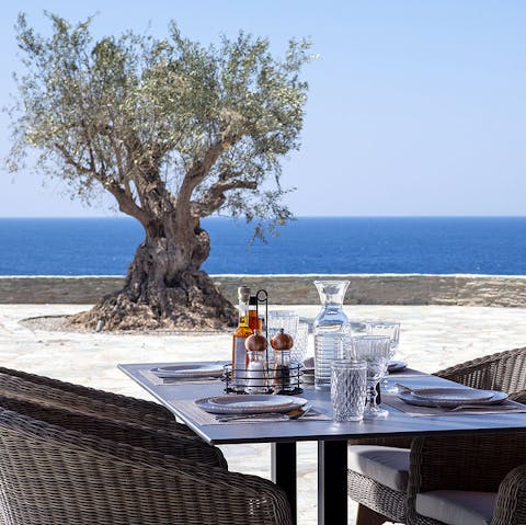 Share delicious alfresco meals and Greek wine 