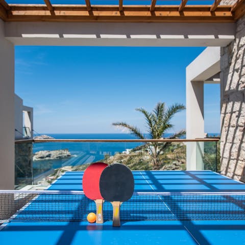Enjoy a game of ping pong up on the balcony