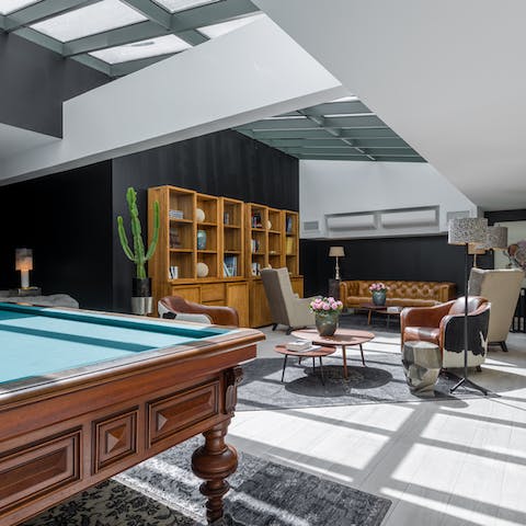 Play a game of pool or chill out in the communal lounge