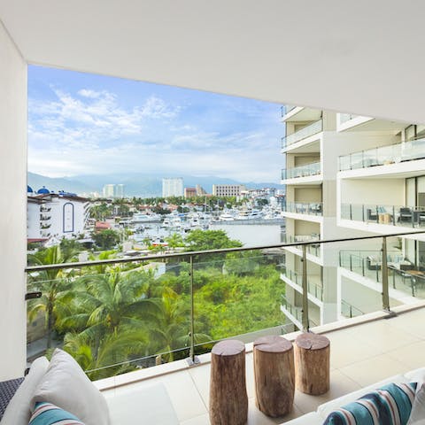 Sit out on the private balcony and look out toward the harbour