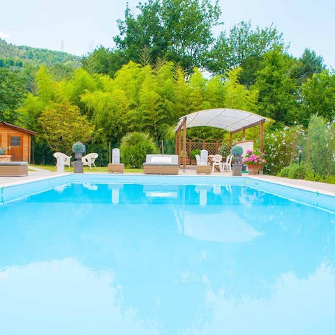 Take a dip in the swimming pool surrounded by rolling Tuscan hills