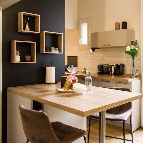 Share romantic suppers or catch up on work in the dining area