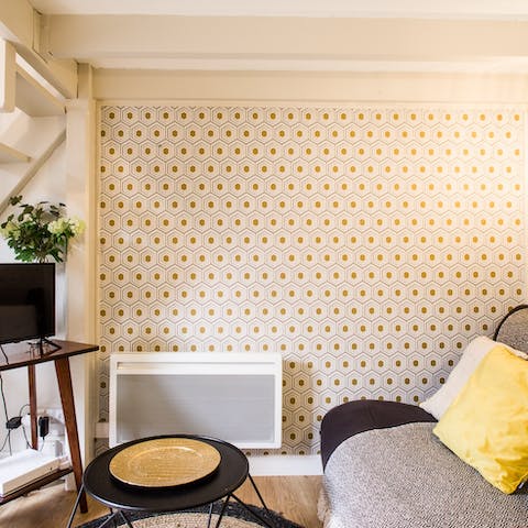 Enjoy cosy evenings of movies and French wine in the compact yet stylish living area