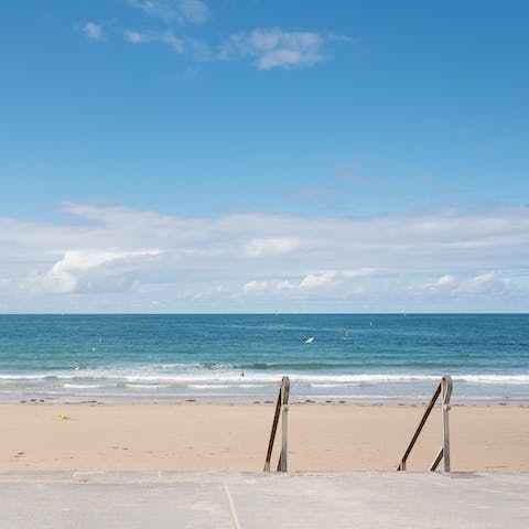 Walk a few steps down to the pristine sands of Plage de la Hoguette