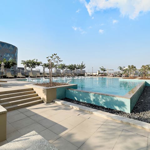 Enjoy the shared swimming pool when the sun is at its peak