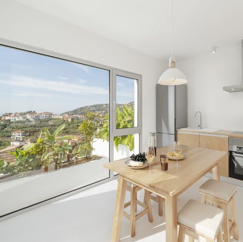 Keep that view in sight even indoors with a wall of glass in the kitchen