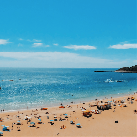 Soak up the warm Portuguese sunshine on the nearby Praia do Túnel