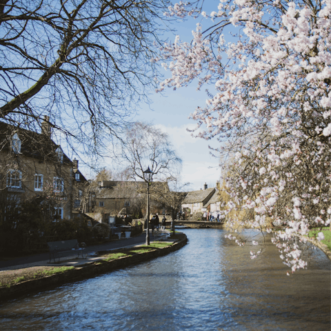 Visit pretty Bourton-on-the-Water, a short drive away