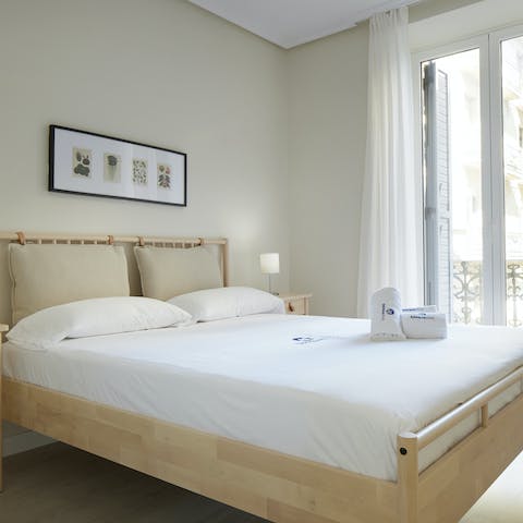 Enjoy a comfortable night's sleep in the spacious main bedroom