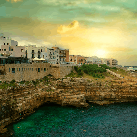 Explore Polignano a Mare with its quaint shops and coastal viewpoints