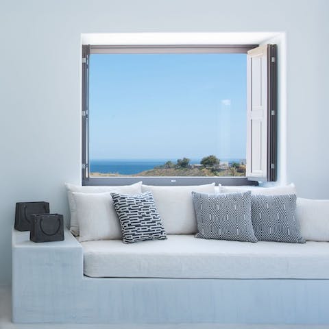 Admire the Aegean Sea views from every inch of this white-washed villa