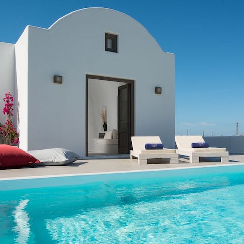 Cool off with a dip in the private infinity pool, then stretch out on the lounge chairs with a glass of wine