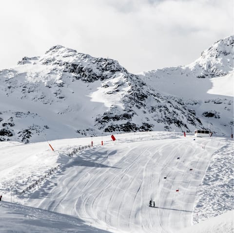 Enjoy some of the world's best slopes with your nearest ski lift a five-minute walk away 