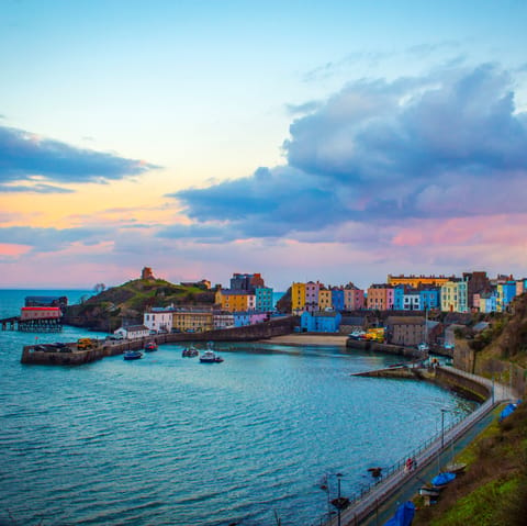 Visit Tenby and its sandy beaches, an eight-minute drive away