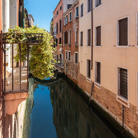 Take your morning espresso onto the Juliet balcony and overlook the canal