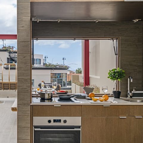 Cook up an alfresco feast in the shared terrace's kitchen