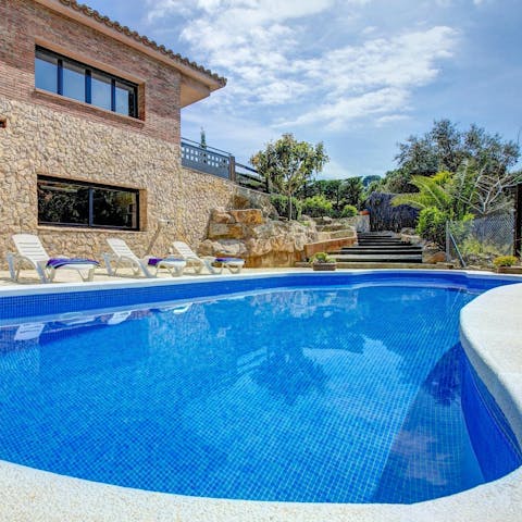 Plunge into the private swimming pool and float about in the cool water