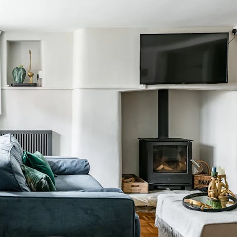 Gather for a Netflix movie night in front of the wood-burning stove