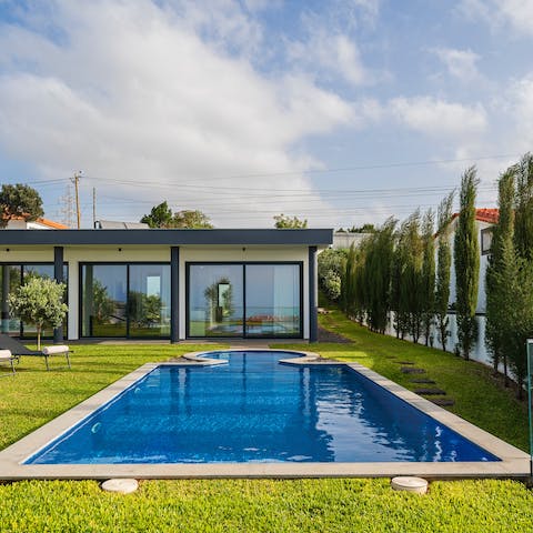 Cool off in the pool before curling up on a deck chair with a book