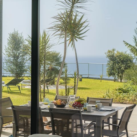 Dine alfresco on the veranda as you admire the view out to sea