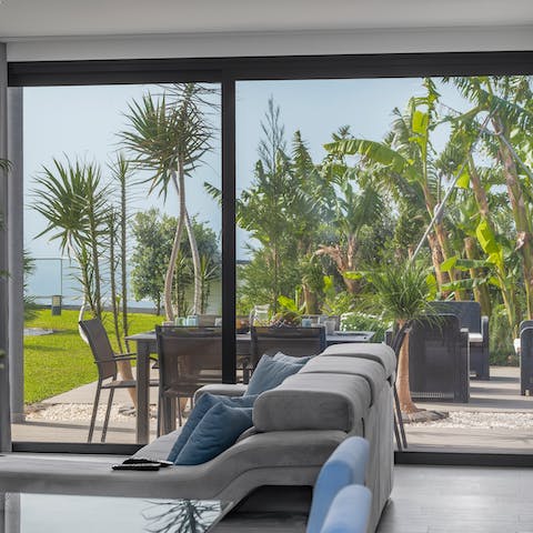 Enjoy picture-perfect vistas out of the floor to ceiling glass windows